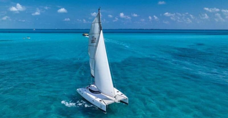 Isla Mujeres Catamaran Tour With Snorkeling & Beach Club - Itinerary Highlights