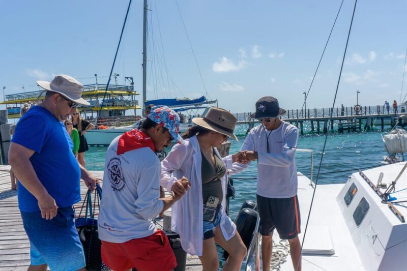 Isla Mujeres Catamaran Tour With Snorkeling & Open Bar - Itinerary and Activities
