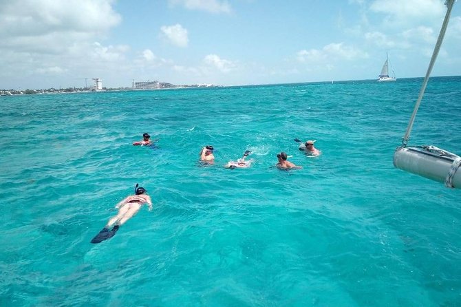 Isla Mujeres Premium Catamaran Tour With Transportation From Playa Del Carmen - Accessibility and Restrictions