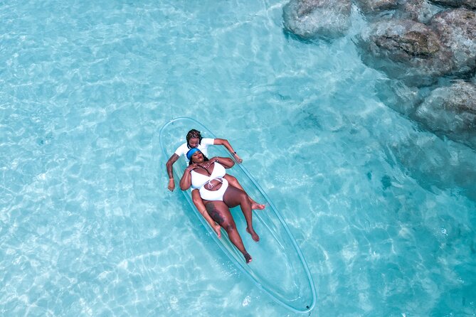 Island Love Stories: Turks & Caicos Clear Kayak Couple Portraits - Preparing for the Adventure