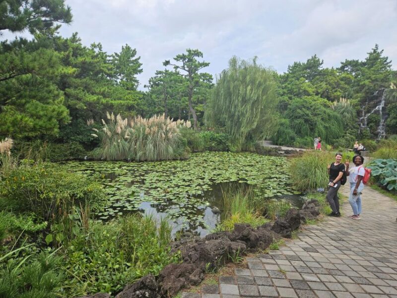 Jeju Island: Highlights Tour With Attraction Tickets & Lunch - Trekking Songaksan Mountain