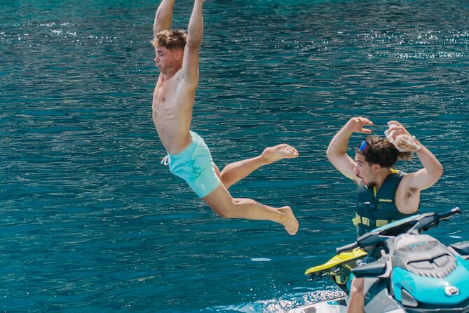 Jet Ski Experience in Cala En Basset and Cueva Sargilau - Included Amenities and Gear