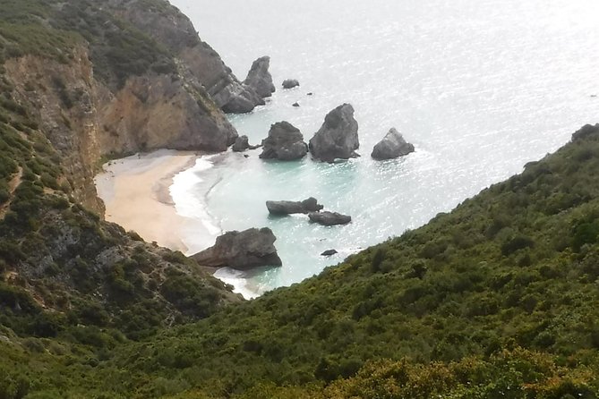 Kayak Tour From Sesimbra to Ribeira Do Cavalo Beach, Passing Through the Caves - Price and Cancellation