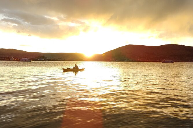 Kayaking Sunrise Titicaca - Paddling Through Reflective Lake Waters