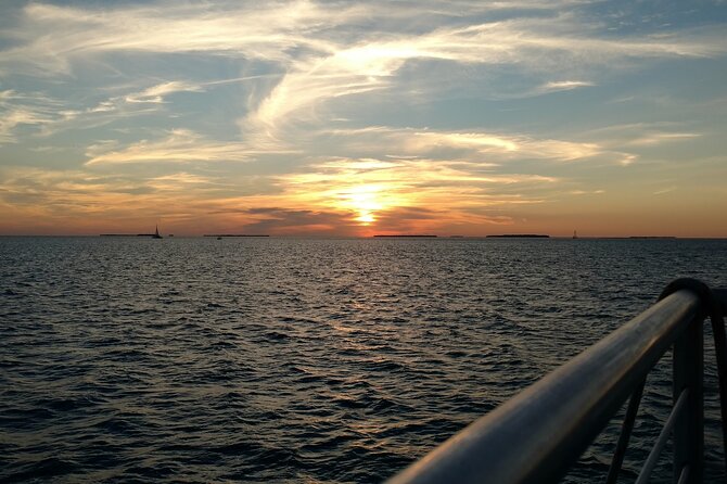 Key West: Smathers Beach & Activities With a Sunset Catamaran & Open Bar - Roundtrip Transportation