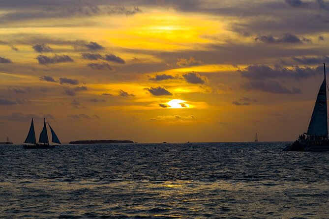 Key West: Smathers Beach & Activities With a Sunset Catamaran & Open Bar - Pricing and Cancellation Policy