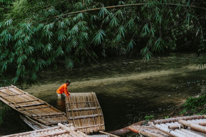 Khao Sok: Private Bamboo Rafting & Jungle Cooking Adventure - Feeding Curious Fish