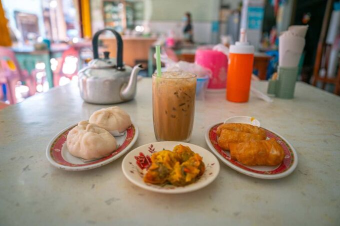 Khaolak Guide Tour to Sunday Market and Rescured Elephant - Itinerary Highlights