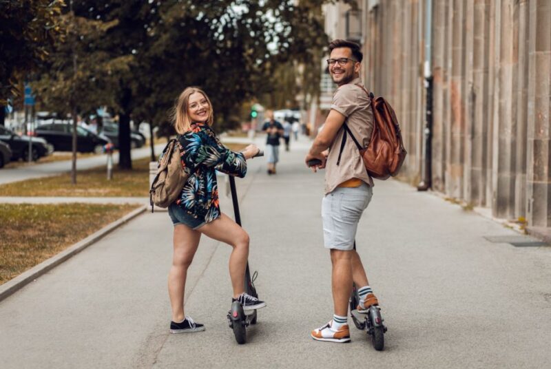 Krakow: Guided Sightseeing E-Scooter Tour With Food Tasting - Explore Historic Neighborhoods