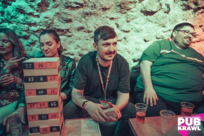 Krakow: Kazimierz Pub Crawl With 1-Hour of Unlimited Drinks - Flexible Booking and Availability