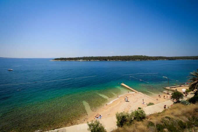 Krk: Boat Trip to Rab & Pag With Sightseeing & Swimming - Boat and Crew Information