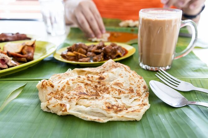 Kuala Lumpur Sunrise Tour With Breakfast Teh Tarik & Roti Canai - Cancellation and Confirmation Policy