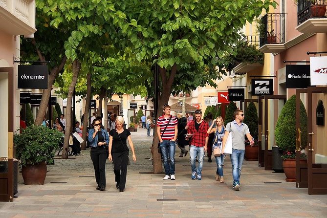 La Roca Village Private Visit With Luxury Vehicle From Barcelona With Pick up - Key Points