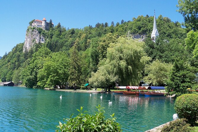 Lake Bled and Castle Half Day Tour Visiting an Old Printing Workshop From Ljubljana - Church Entrance and Luck Bell