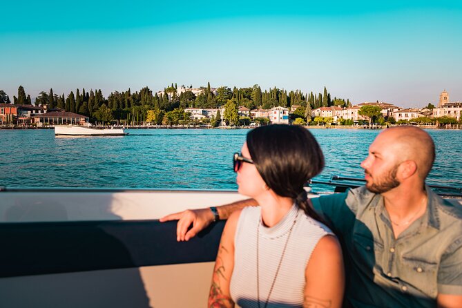 Lake Garda Sunset Cruise From Sirmione With Prosecco - Grotte Di Catullo and Scaliger Castle