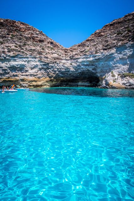 Lampedusa: Yacht Excursion, Swimming Stops and Typical Lunch - Departure and Return