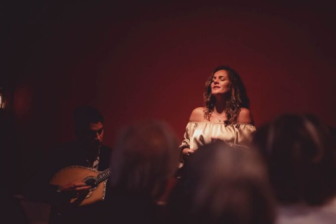 Lisbon: Evening Intimate Live Fado Music Show With Port Wine - Taking in Lisbons Ambiance
