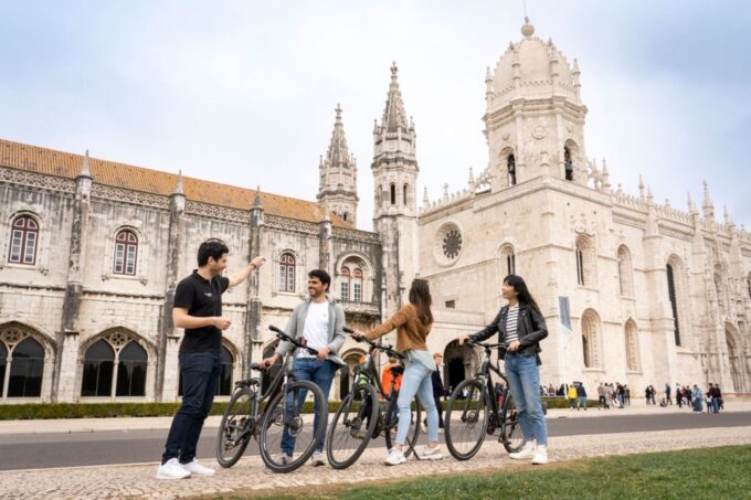 Lisbon: Guided Bike Tour, Helicopter Flight, and Boat Trip - Exploring Lisbon