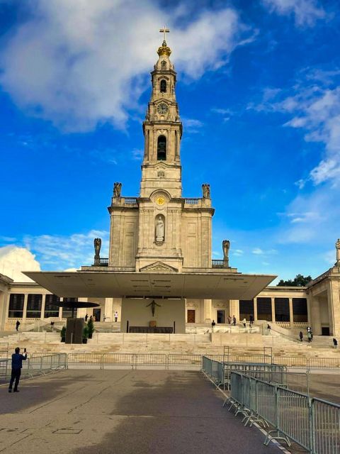 Lisbon: Private Transfer to Porto With Stops Until 3 Cities - Fátima: Renowned Pilgrimage Site