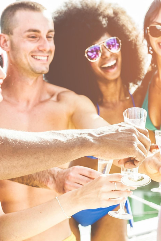 Lisbon: Sightseeing Cruise With Open Bar, DJ & Swim Stop - Entertainment and Open Bar