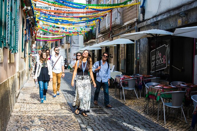 Lisbon Small-Group Walking Tour: Wine, Seafood Lunch, Ferry Ride - Tasting Traditional Pastries and Seafood