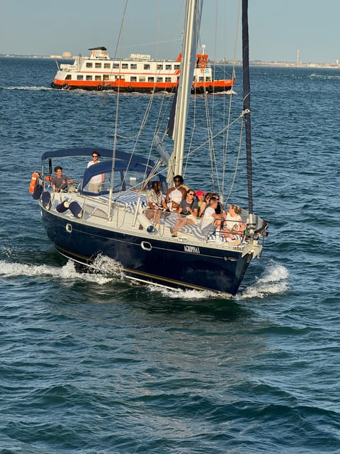 Lisbon: Sunset Boat Tour With Wine - Experience Highlights