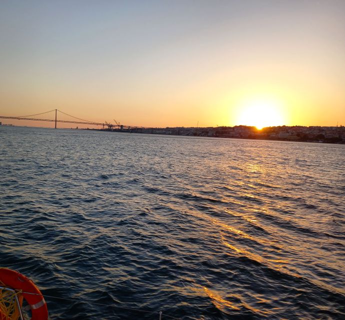 Lisbon: Sunset Catamaran Cruise With Welcome Drink - What to Expect