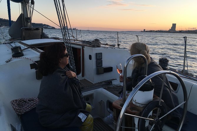 Lisbon Sunset Sailing Tour With White or Rosé Wine and Snacks - Confirmation and Accessibility