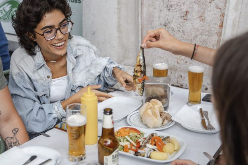 Lisbon: Tipsy Food Walking Tour With Snacks and Drinks - Meeting Point and Itinerary