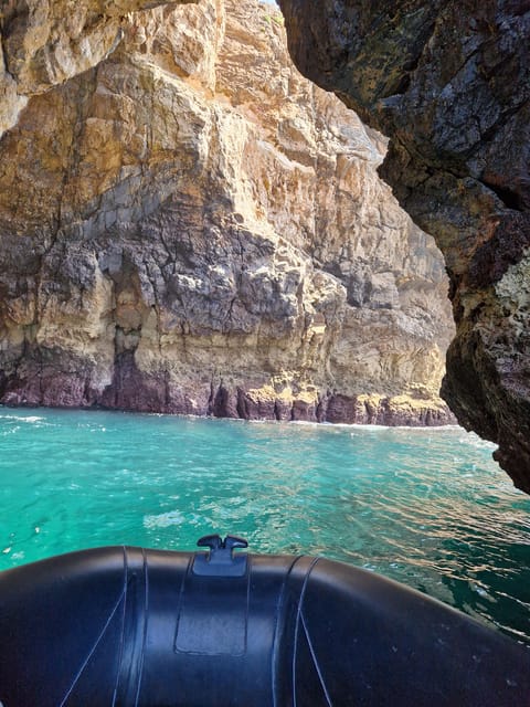 Lisbon To Sesimbra: Boat Tour Dolphins, Caves & Wine Tasting - Frequently Asked Questions