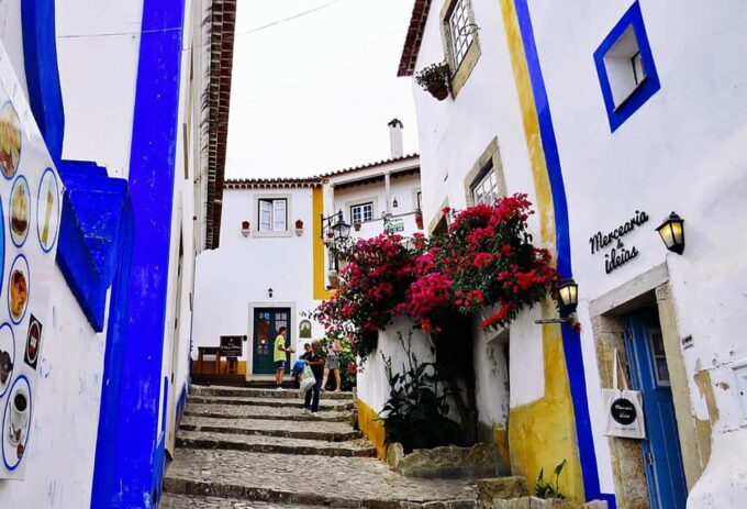 Lisbon: Transfer to Porto With Stops in Óbidos-Nazaré-Aveiro - Frequently Asked Questions