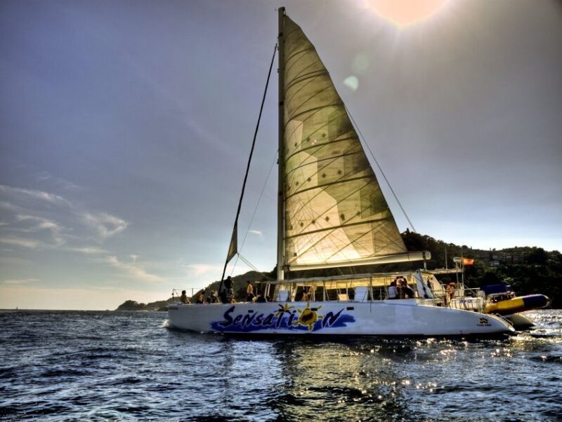 Lloret De Mar: Sunset Catamaran Cruise With DJ and Drinks - Inclusions and Restrictions