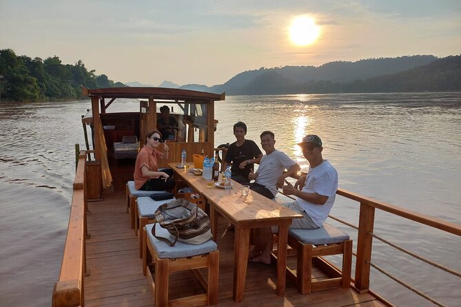 Luang Prabang Mekong Sunset Cruise and Hot Pot Dinner - Key Points