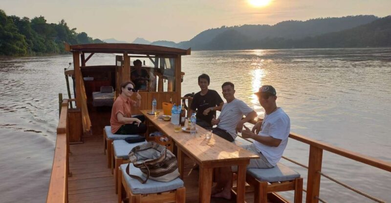 Luang Prabang: Mekong Sunset Cruise and Hot Pot Dinner - Dining Experience at Sin Dat