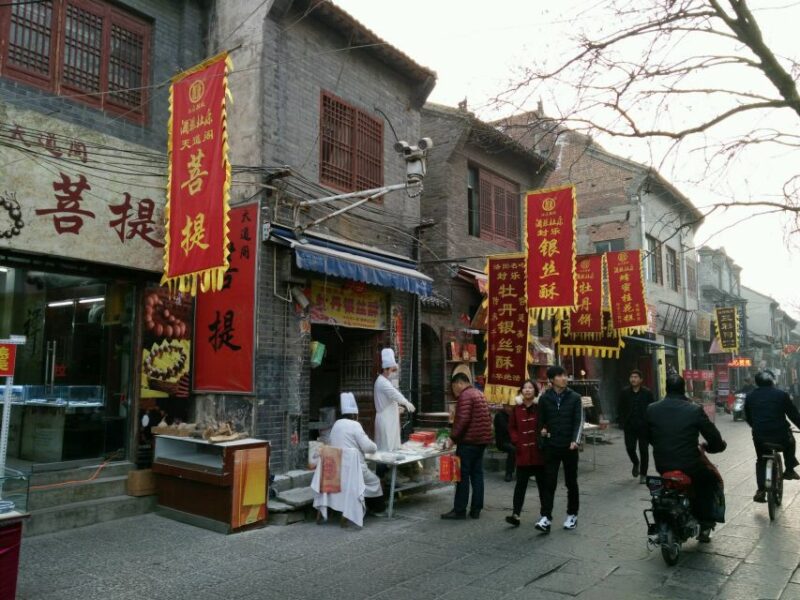 Luoyang Classic Day Tour Longmen Grottoes Old Twon Explore - Key Points