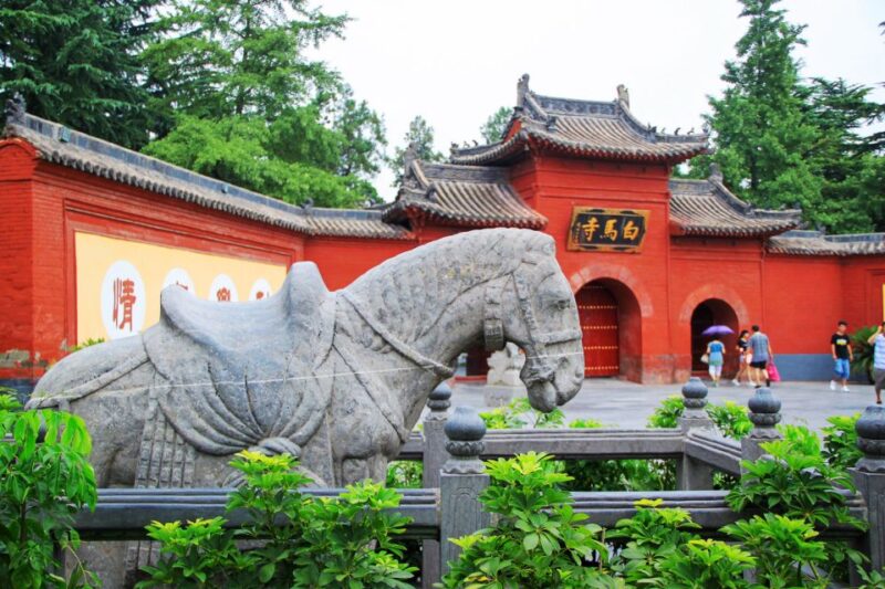 Luoyang Classic Day Tour Longmen Grottoes Old Twon Explore - Itinerary Highlights