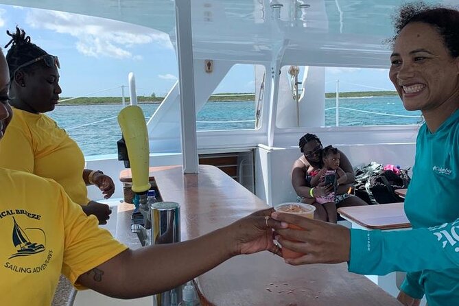 Luxury Catamaran Cruise: Sip, Sail, Snorkel, and Swim With Pigs! - Transportation and Policies
