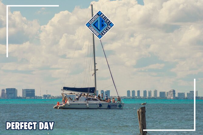 Luxury Catamaran Tour to Isla Mujeres With Transportation From Tulum - Environmental Fees