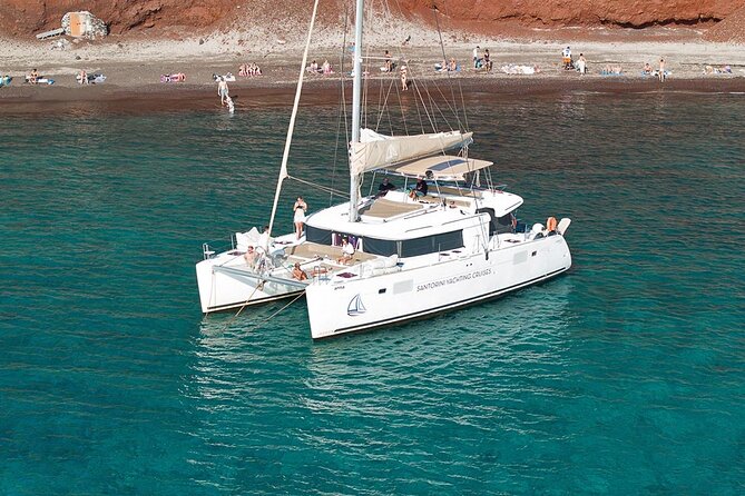 Luxury Santorini Sailing Cruise: Lunch, BBQ, Open Bar, Transfers - Inclusions and Features