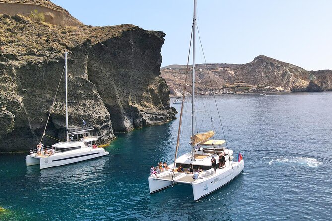 Luxury Santorini Sunset Cruise: Dinner, BBQ, Open Bar, Transfers - Booking Information