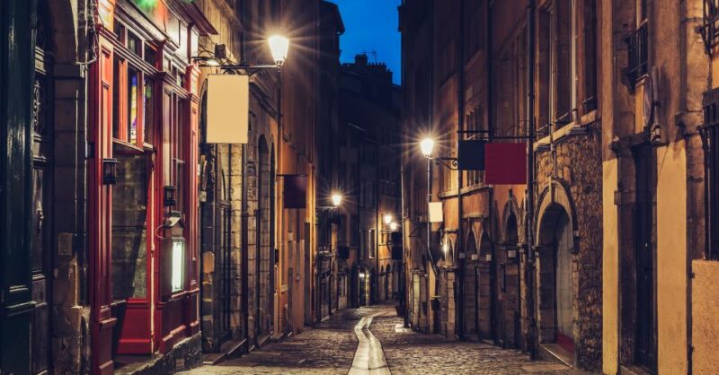 Lyon Sunset Food Tour With Full Meal and Wine - Indulging in Traditional Delicacies