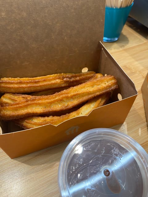 Maastricht: Unlimited Dutch Poffertjes and Spanish Churros … - Serving and Eating the Snacks