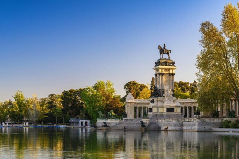 Madrid Bike Tour With Churros Plus Ham & Wine Tasting Option - Key Points