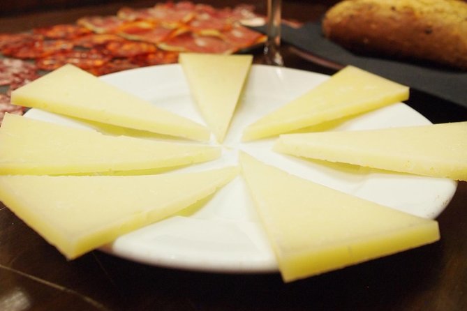 Madrid Historical Walking Tour With Wine and Food Tasting - Tapas and Spanish Dishes