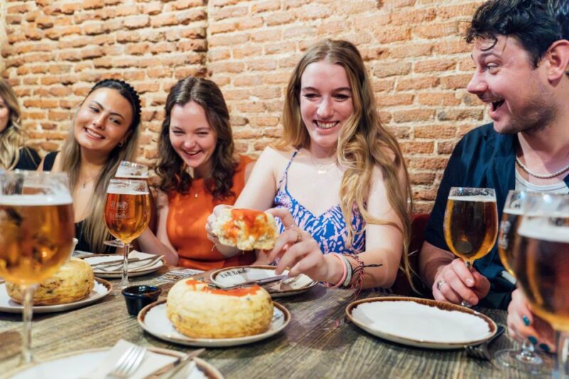 Madrid: Tapas Crawl Food Tour With 6 Tapas and 4 Drinks - Key Points