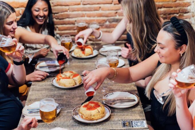 Madrid Tipsy Tapas Guided Food Tour With Dinner - Explore Madrids Neighborhoods