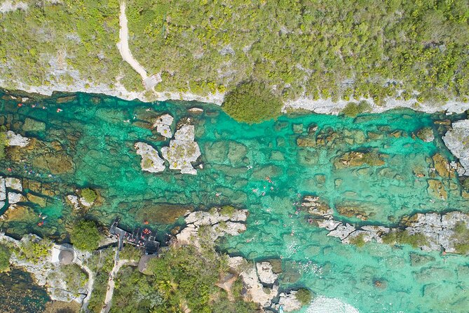 Magical Cenote and Paradise Lagoon Snorkeling Adventure - Bottled Water and Snorkel Gear