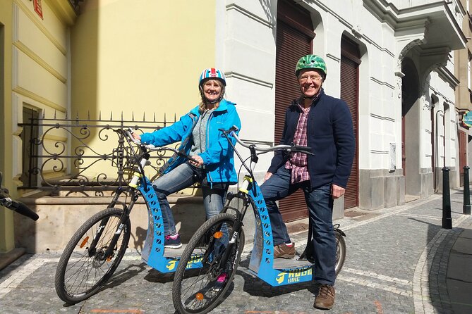 Magical Prague City Tour 60-Min by E-Bike / E-Scooter - Live Guiding and Insights