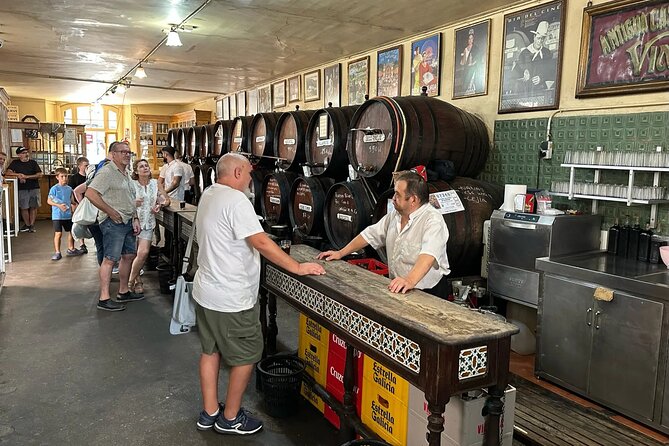 Malaga Food Walking Tour With Tapas & Wine Tasting - Local English-Speaking Guide