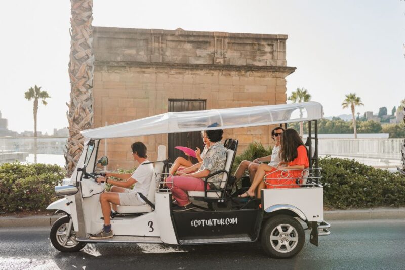 Malaga: Private City Tour by Eco Tuk Tuk - Beach and Lighthouse